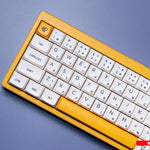 keyboard with custom milk & bee keycaps kit