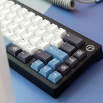 custom snow keycaps on a mechanical keyboard
