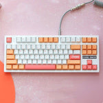 custom keyboard with peach keycaps